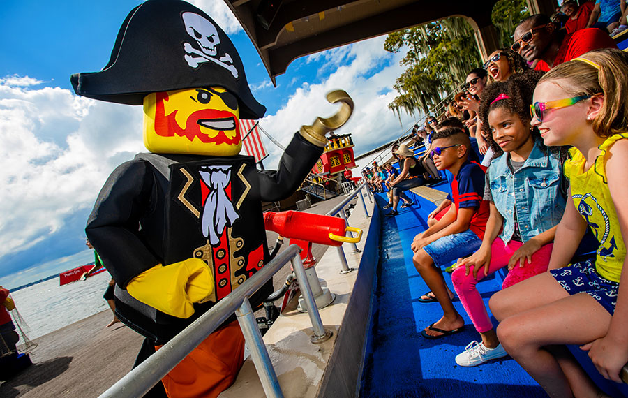 lego pirate costumed character performing for kids on front row legoland florida resort
