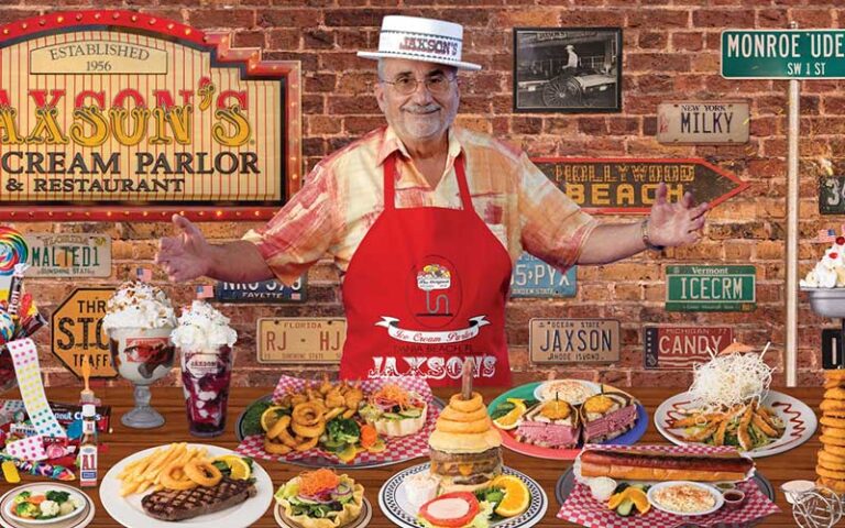 man standing with sideboard of many entrees at jaxsons ice cream parlor fort lauderdale