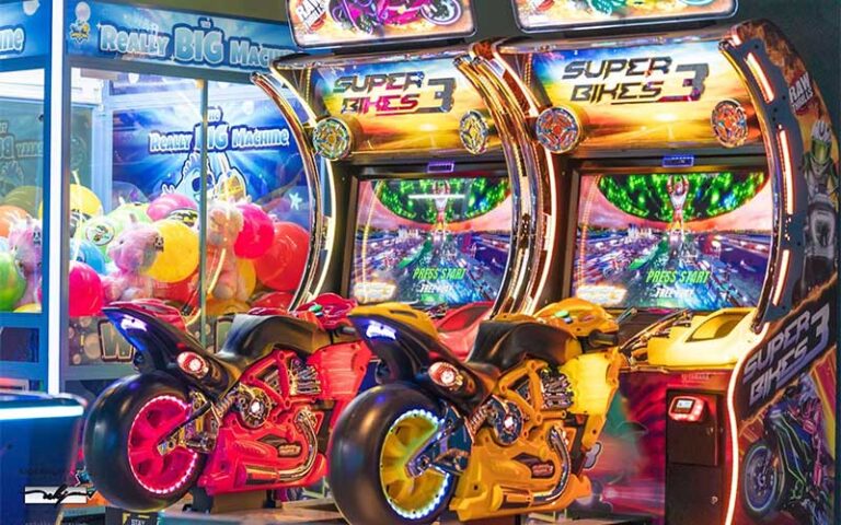 motorcycle racing game next to crane game at pinfish entertainment tavernier fl keys