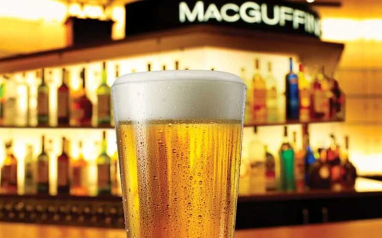 pint of golden beer with bar sign macguffin at amc dine in coral ridge mall ft lauderdale