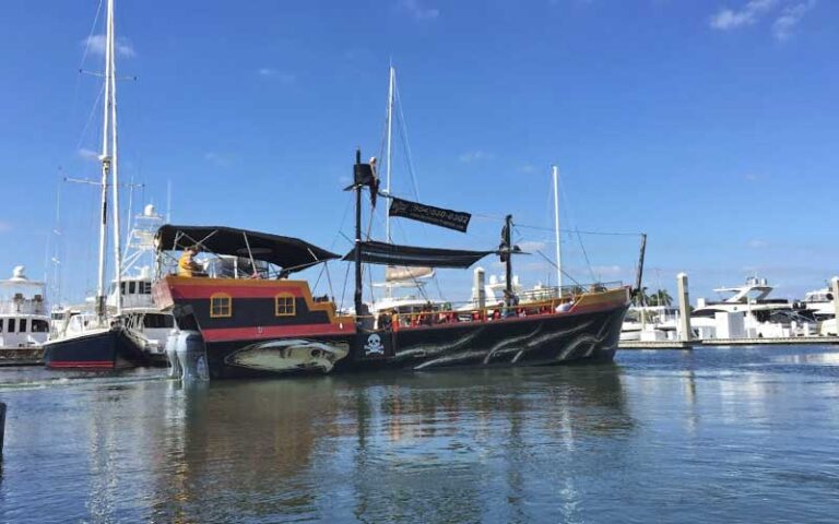 pirate style ship in marina with yachts at bluefoot pirate adventures fort lauderdale