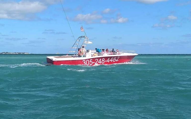 red tow boat with ropes leading up at z flight parasail watersports marathon fl keys