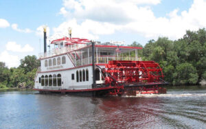 view of red and white sternwheeler riverboat at st johns rivership co sanford