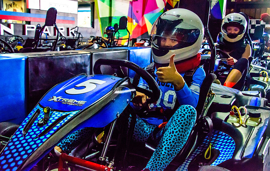 young people in indoor go karts ready to race xtreme action park fort lauderdale
