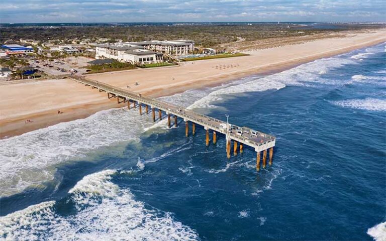 aerial over ocean of pier and resort along beach at embassy suites st augustine beach