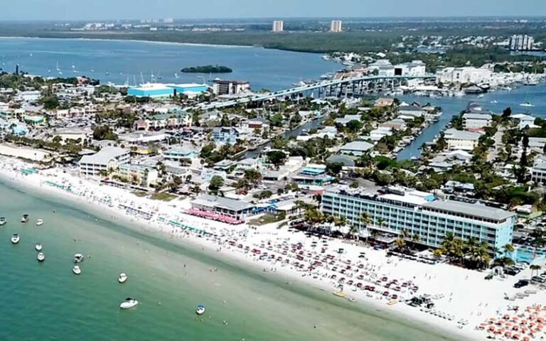 aerial view of shoreline with hotels and boats at lana kai island resort fort myers beach