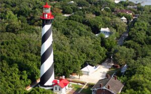 aerial view of striped lighthouse and grounds at st augustine lighthouse maritime museum