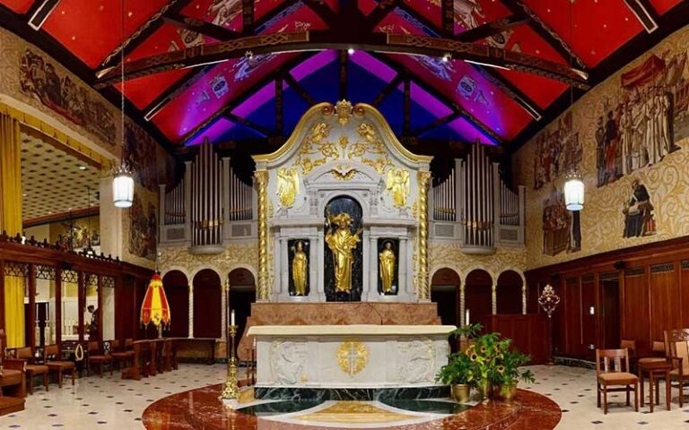 altar piece with murals and red ceiling at cathedral basilica of st augustine