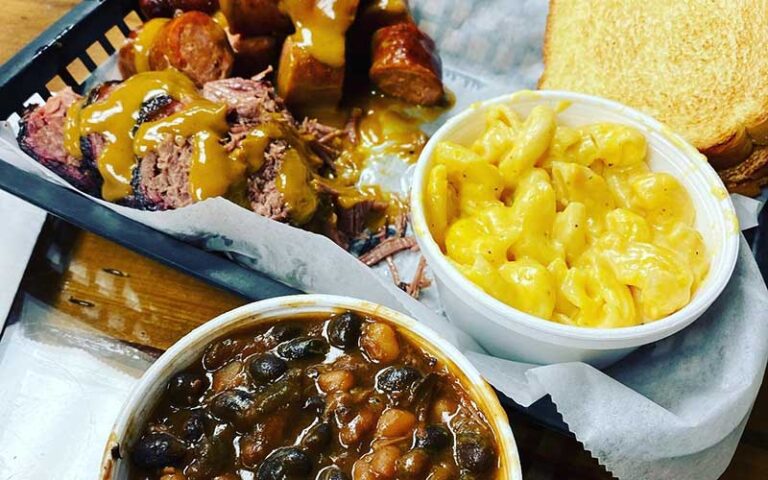 barbecue plate with mac and cheese toast and beans at woodpeckers backyard bbq st augustine