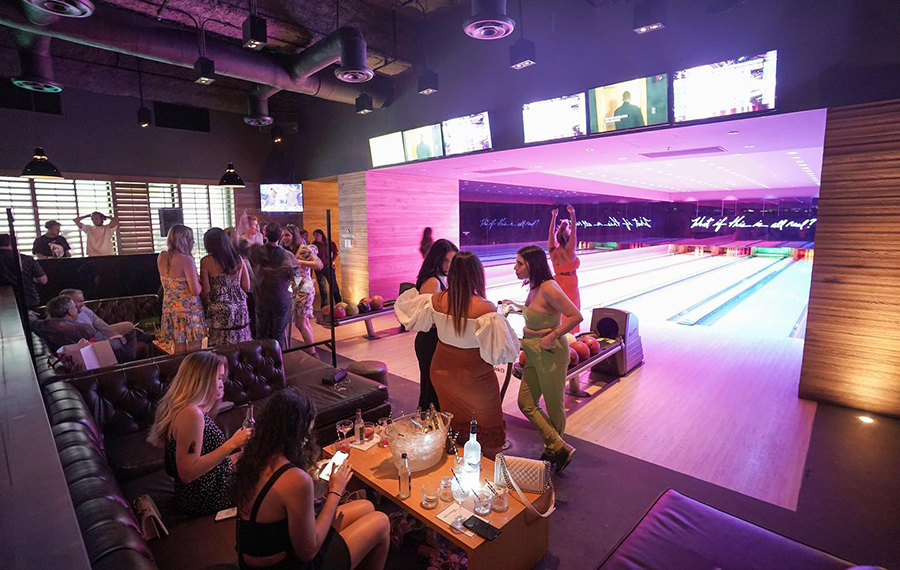 bowling lanes with crowded lounge basement bowl and skate miami