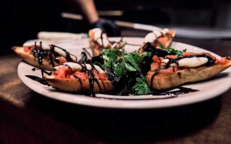 bruschetta on plate at pizzalleys chianti room st augustine