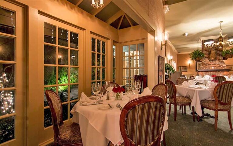 classic dining room area with set tables at the veranda fort myers