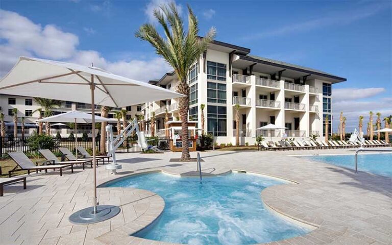 daytime exterior of jacuzzi pool area at embassy suites st augustine beach