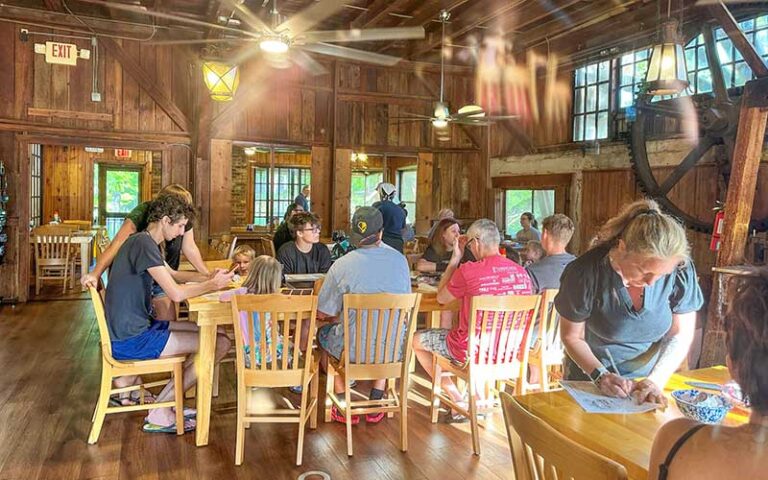 dining area with family sized tables at old sugar mill pancake house de leon springs
