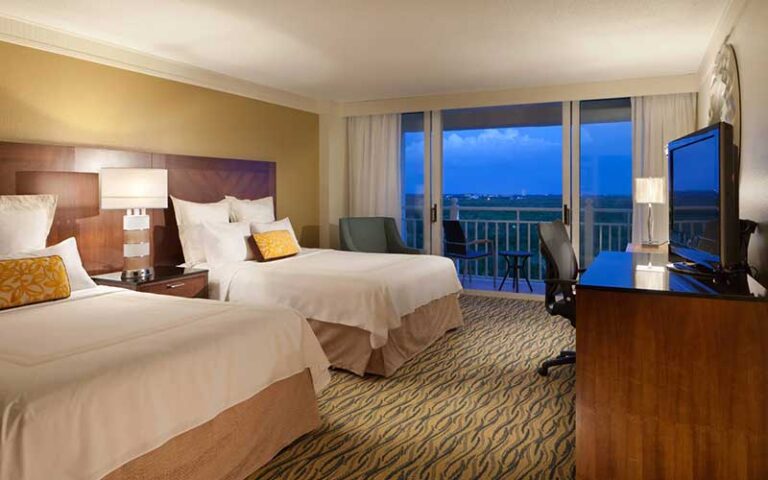 double bed suite with balcony and night view at marriott sanibel harbour resort spa fort myers