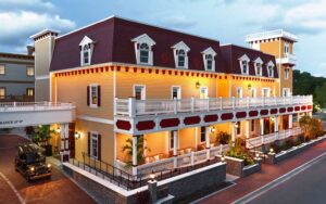 evening exterior of yellow luxury hotel at renaissance st augustine historic downtown hotel