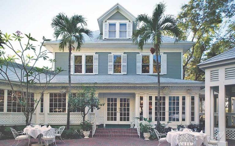 front exterior of historic house with courtyard at the veranda fort myers