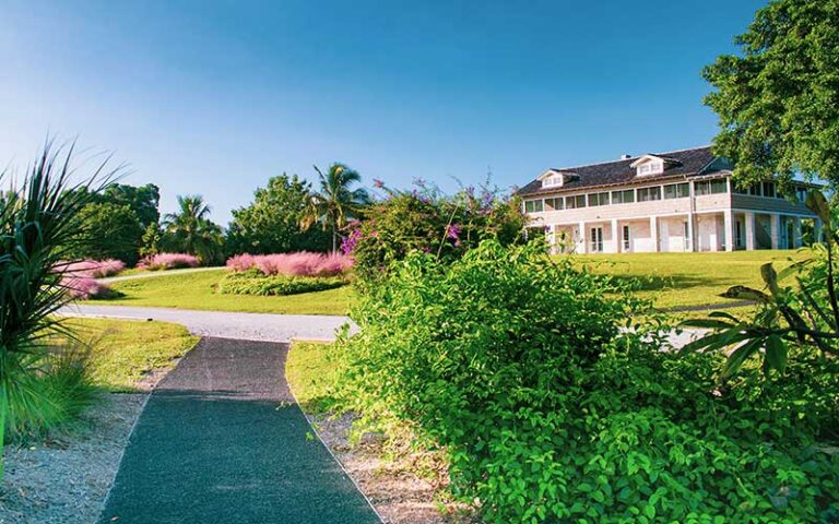 historic house on hill with garden path at mound house at fort myers beach