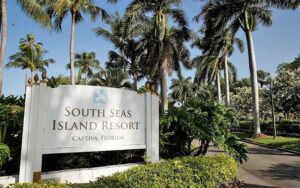 hotel entrance sign with rows of palms at south seas island resort captiva sanibel fort myers
