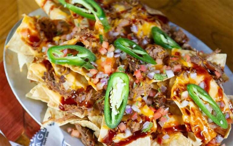 loaded plate of nachos with jalapenos at fords garage fort myers