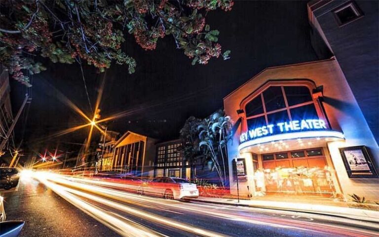 long exposure traffic on eaton street at night with marquee at key west theater