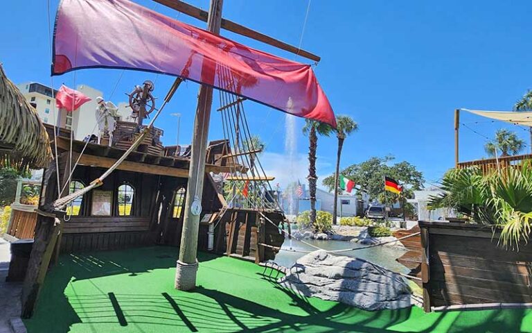 mini golf green on pirate ship deck at smugglers cove adventure golf fort myers beach
