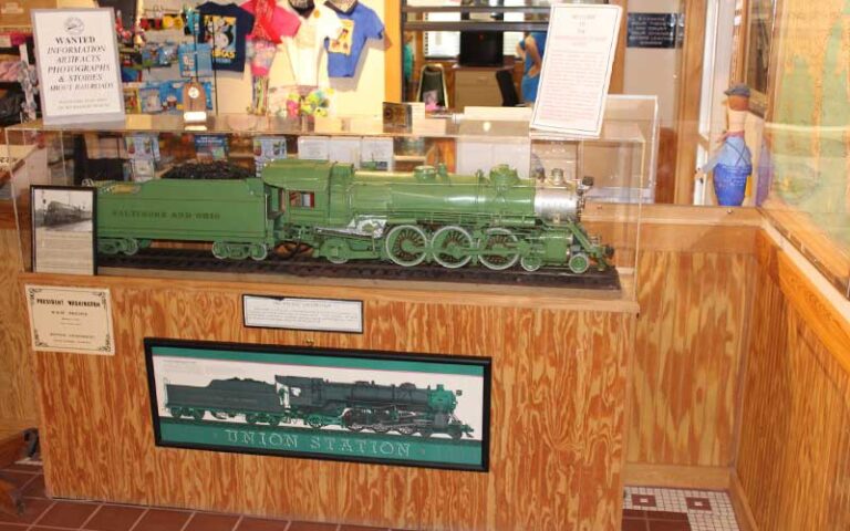model train green locomotive in display case at railroad museum of south florida fort myers