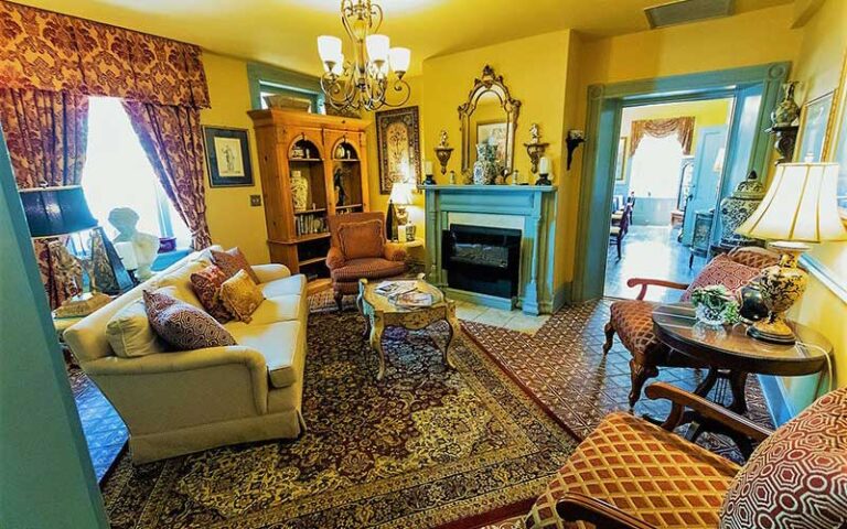 parlor room with comfortable seating and fireplace at casa de solana st augustine