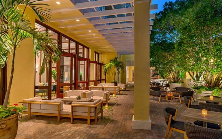patio terrace dining with warm lighting at night at hyatt regency coconut point resort spa fort myers