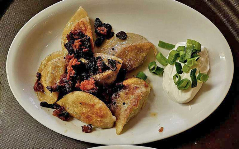 pierogi with berries sour cream and chive at gaufres and goods st augustine