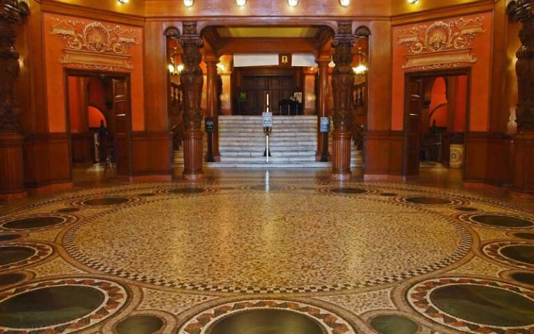 rotunda room with ornate tile and woodwork at historic tours of flagler college st augustine