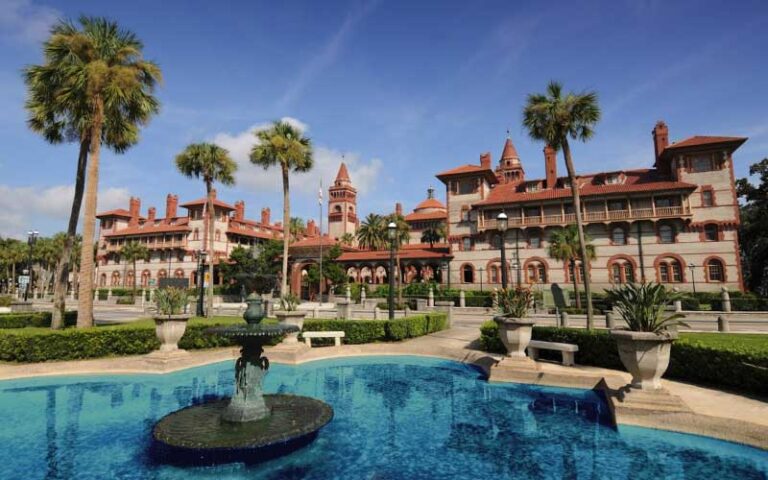 spanish architectural buildings with fountain and palms at historic tours of flagler college st augustine
