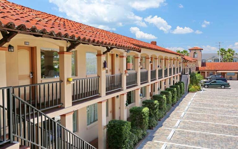 spanish style hotel building with parking at la fiesta ocean inn suites st augustine beach