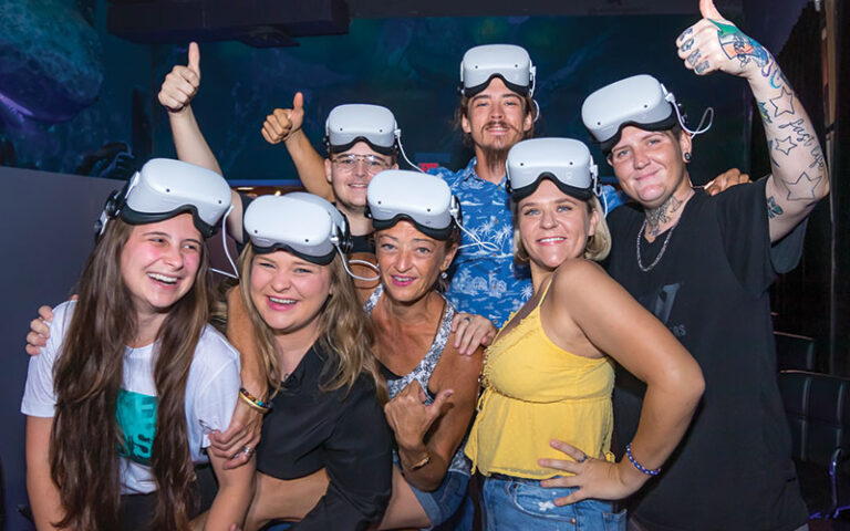 young people cheering with vr headsets at lonely dog immersive orlando