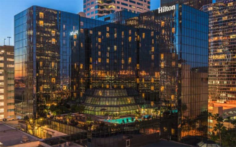 aerial view of high rise buildings with rooftop pool at hilton tampa downtown