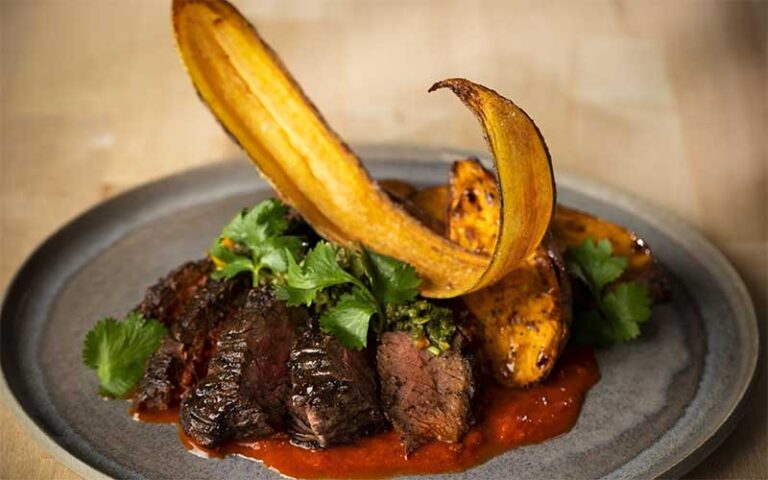 beef cuts with plantain entree at cmx cinebistro siesta key sarasota