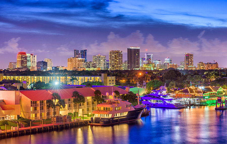 colorful twilight aerial view of fort lauderdale with skyline river and yachts