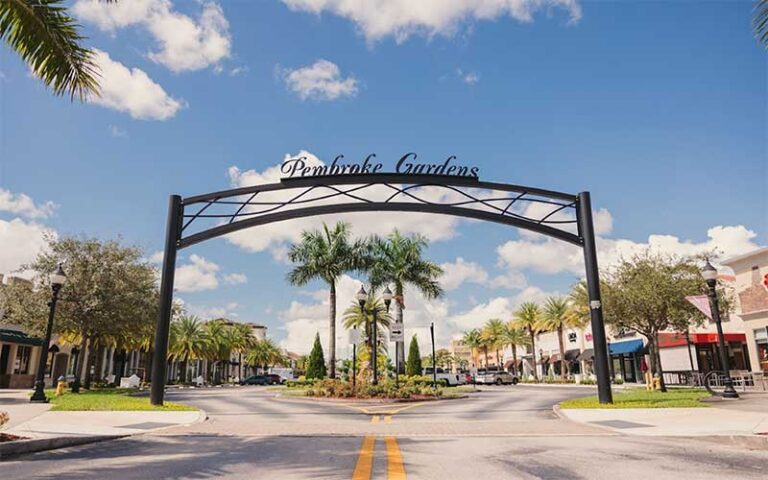 driveway with gate and lettering with landscaping at shops at pembroke gardens ft lauderdale