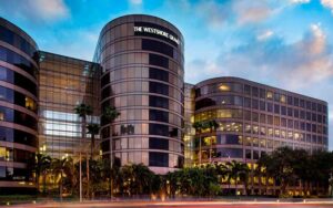 exterior of high rise hotel with twilight sky and street lighting at the westshore grand tampa