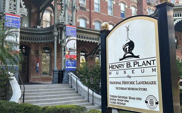 front entrance of building with sign at henry b plant museum tampa