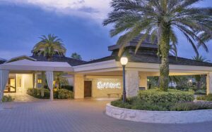 front exterior of resort with drive up at twilight at saddlebrook resort tampa