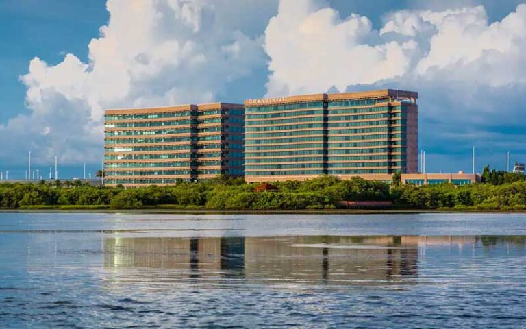 hotel exterior view from bay with cloudy sky at grand hyatt tampa bay