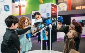 kids interacting with physics exhibit at mosi museum of science industry tampa