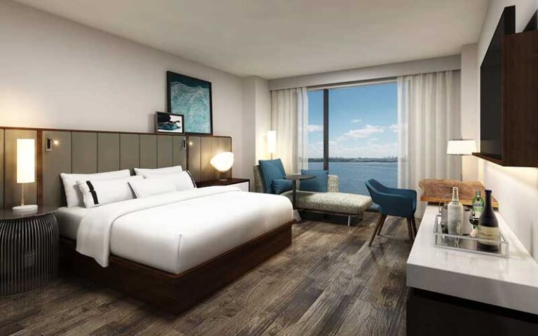 king bed guestroom with bay view at the current hotel tampa