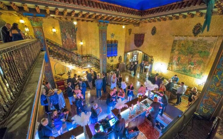 loft view of crowded lobby with mediterranean decor at tampa theatre