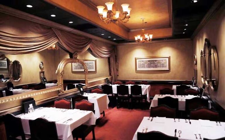 luxurious dining room with red and gold at berns steak house tampa