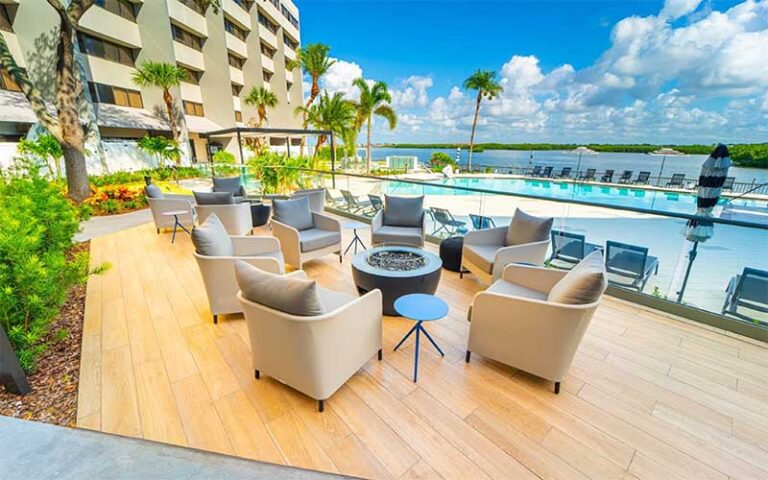 patio deck beside pool with bay view at doubletree by hilton tampa rocky point