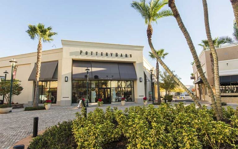 pottery barn storefront on corner with palm trees at the shops at wiregrass tampa