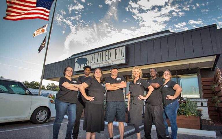 restaurant exterior with staff at deviled pig tampa