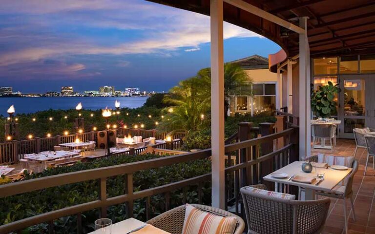 restaurant terrace with view of night sky over bay at grand hyatt tampa bay